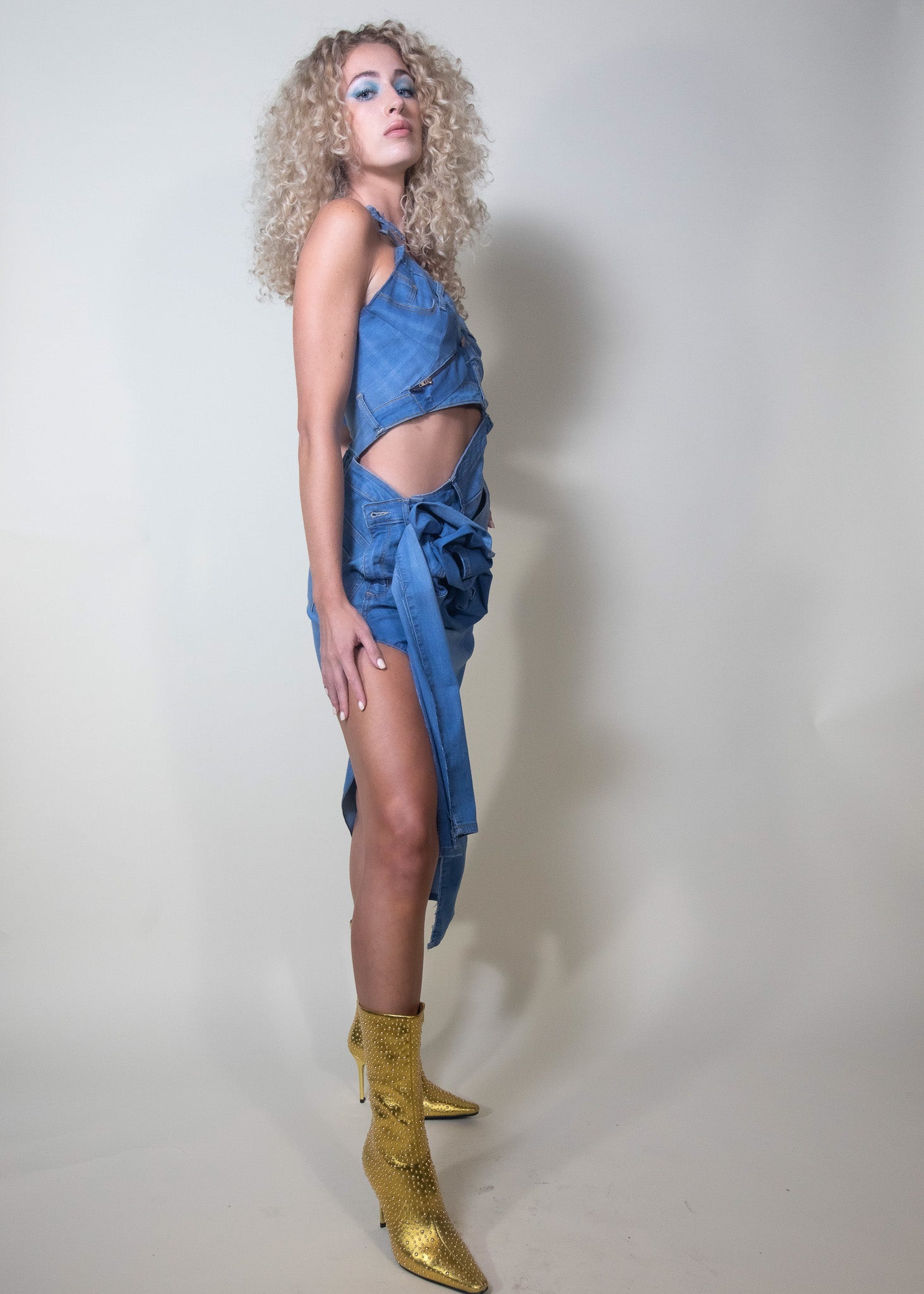 custom midi denim dress, 2023 Alta Costura Collection, Pura Stella dress, cut-out denim dress, hand-made denim flowers, unique denim design, tailored dress, made-to-order dress, exclusive fashion piece, sophisticated denim dress, sensual cut-out details, high fashion denim