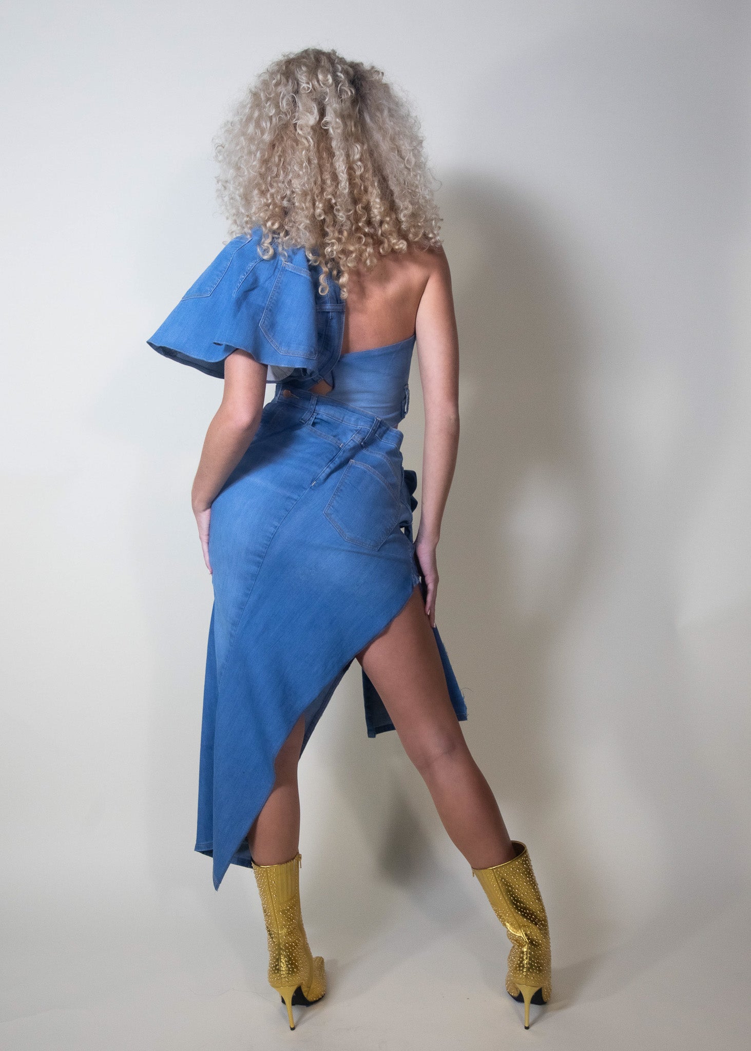 custom midi denim dress, 2023 Alta Costura Collection, Pura Stella dress, cut-out denim dress, hand-made denim flowers, unique denim design, tailored dress, made-to-order dress, exclusive fashion piece, sophisticated denim dress, sensual cut-out details, high fashion denim