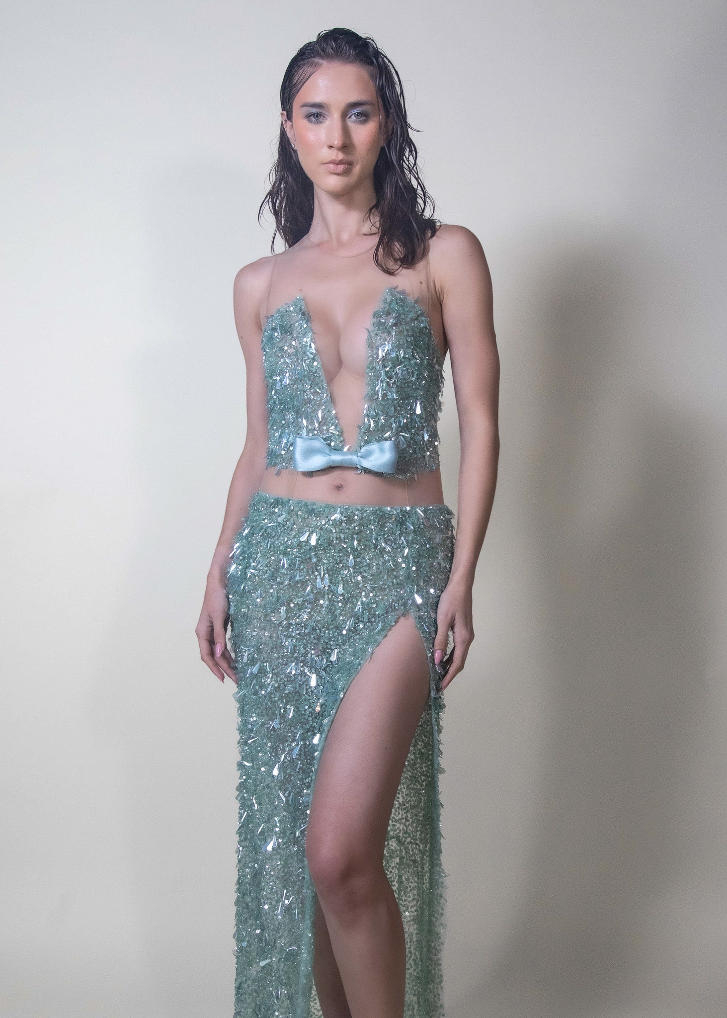 Pura Stella gown, Alta Costura 2023 Collection, celeste-colored gown, fully embellished gown, thigh-high slit dress, sheer back gown, contemporary elegance, lined gown, high-fashion eveningwear, limited edition dress, made-to-order gown, haute couture gown, glamorous dress